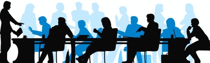 Illustration av m&auml;nniskor vid ett m&ouml;tesbord